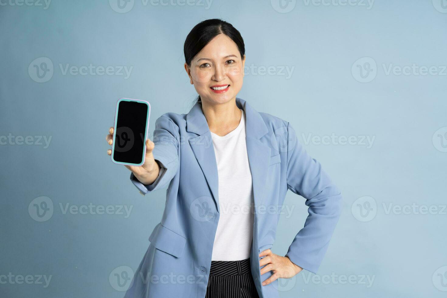 Portrait of a businesswoman using a smart phone photo