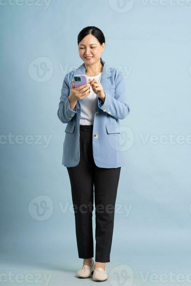 full body photo of a middle-aged businesswoman