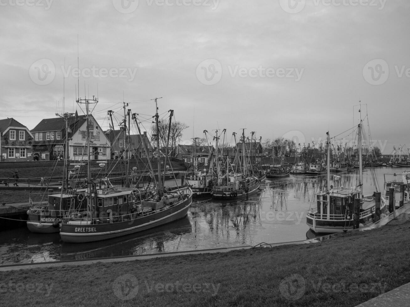 greetsiel at the north sea in germany photo