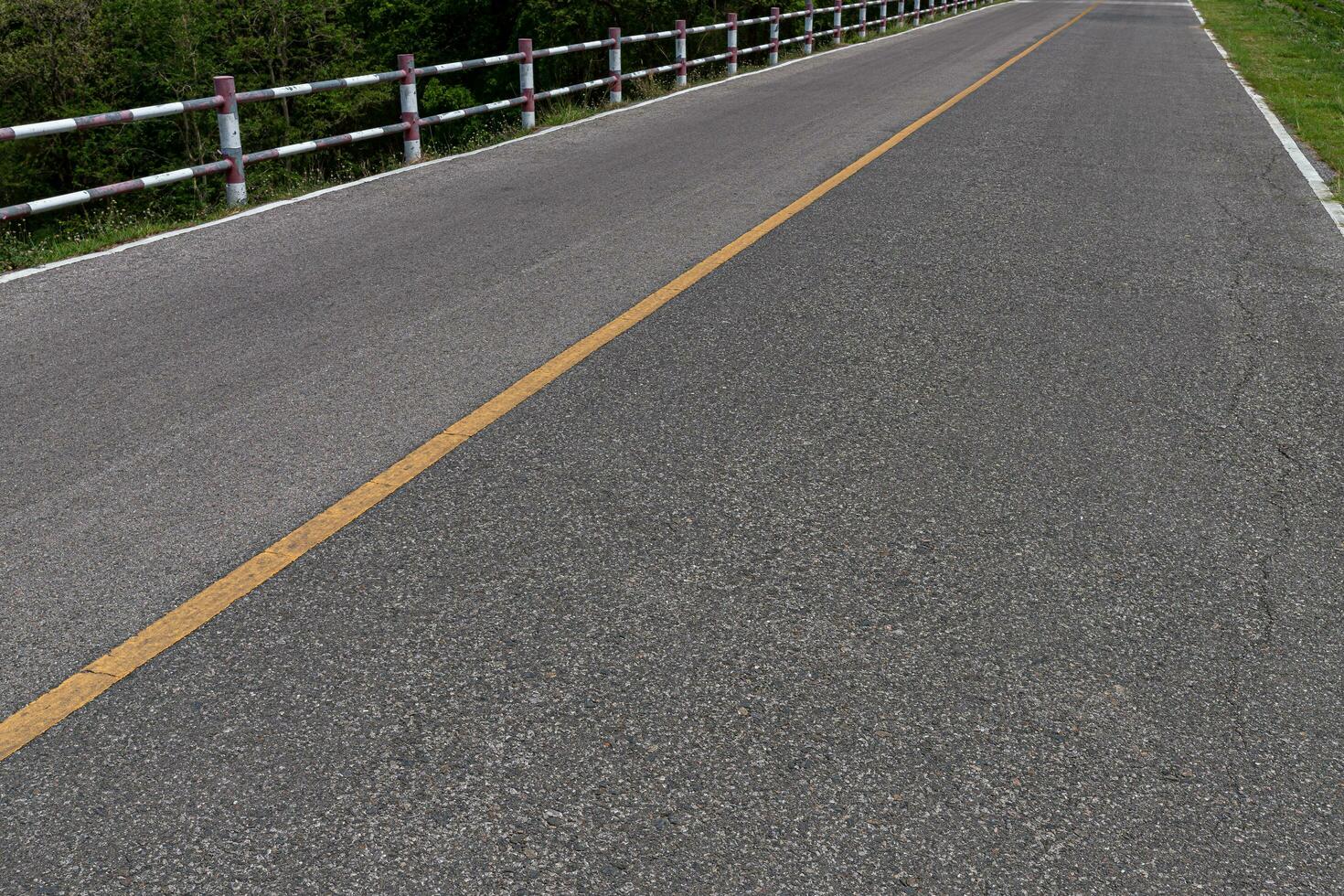 Asphalt road with marking lines white stripes texture Background. photo