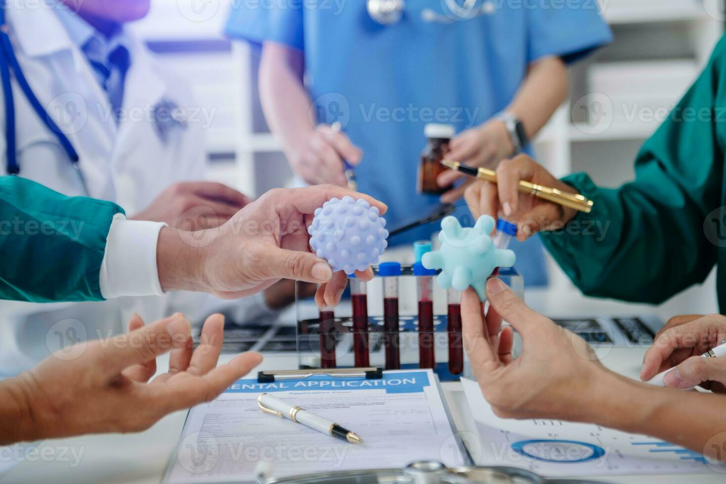 Medical technology network team meeting concept. Doctor hand working with smart phone modern digital tablet and laptop computer with graphics chart interface, with virtual icon diagram photo