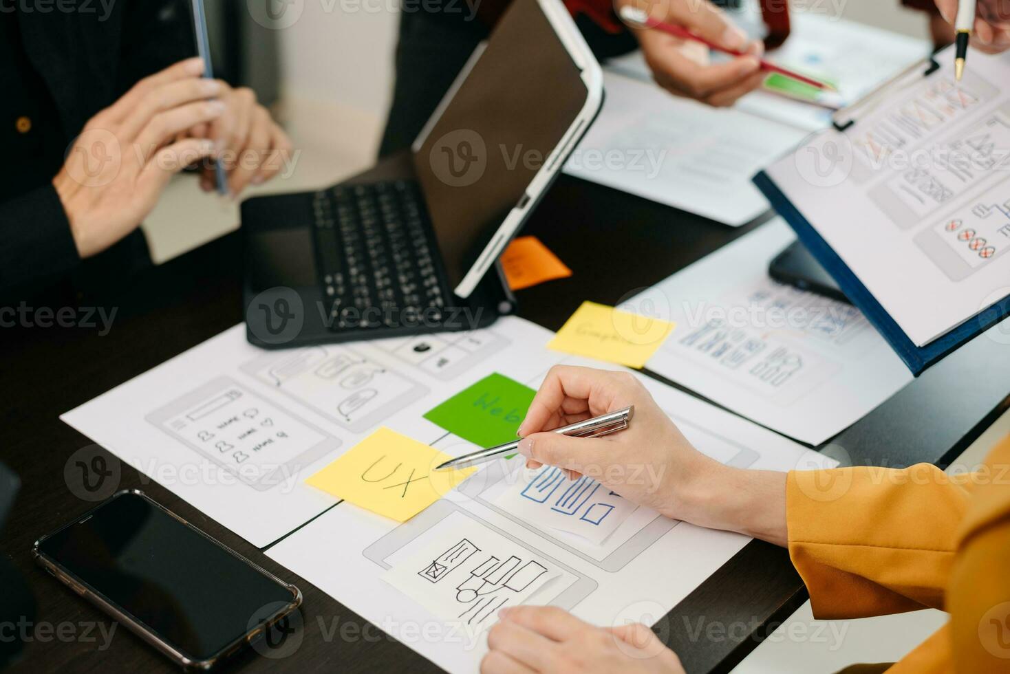 UX graphic designer planning application process development prototype wireframe for web smart phone. Creative digital development agency. photo