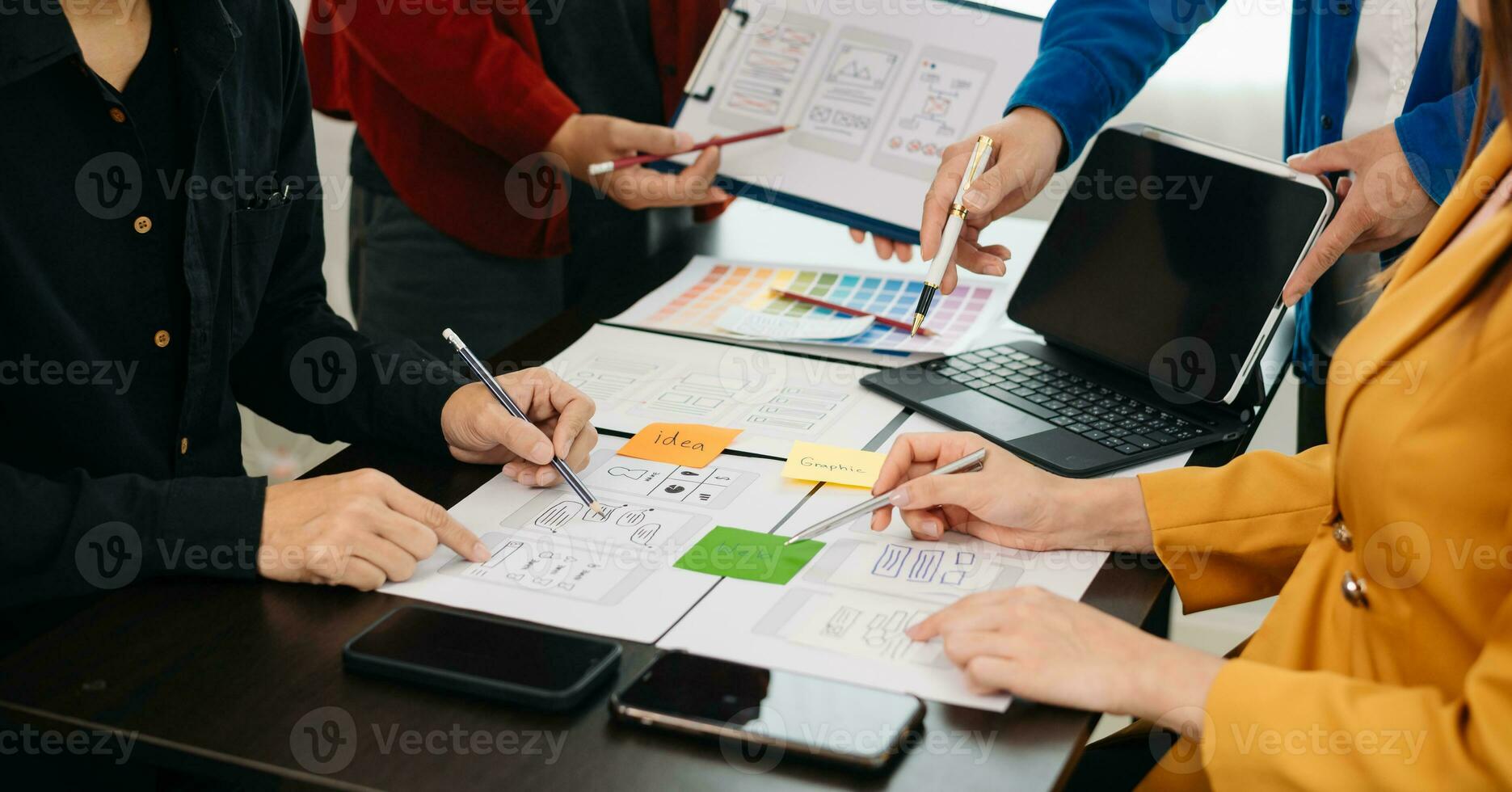 UX graphic designer planning application process development prototype wireframe for web smart phone. Creative digital development agency. photo