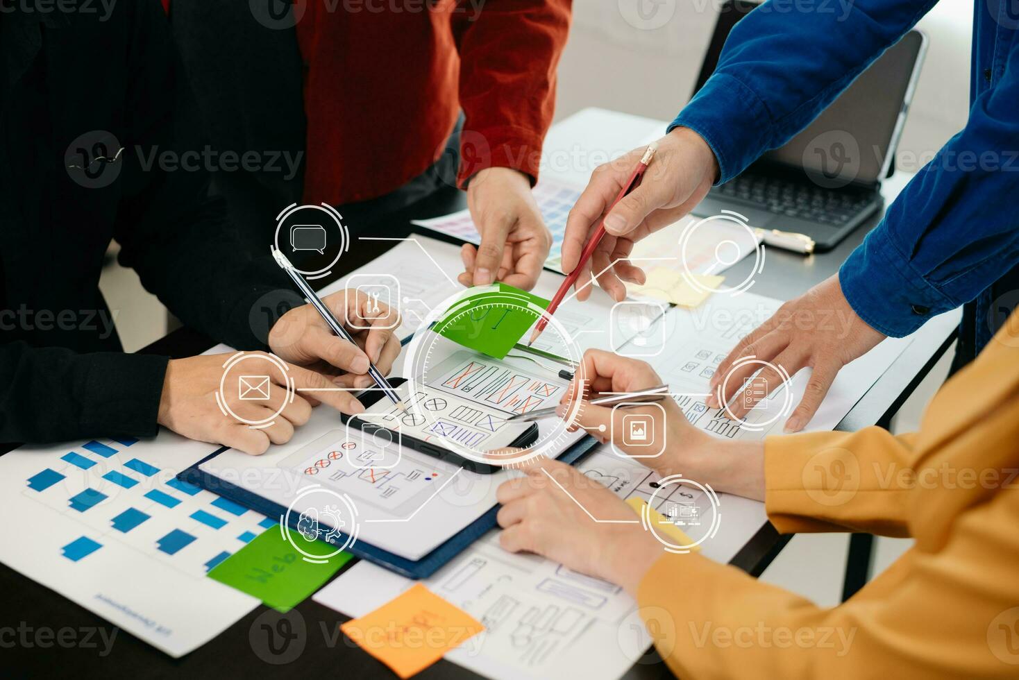 UX developer and ui designer brainstorming about mobile app interface wireframe design with customer breif and color code at modern office. photo