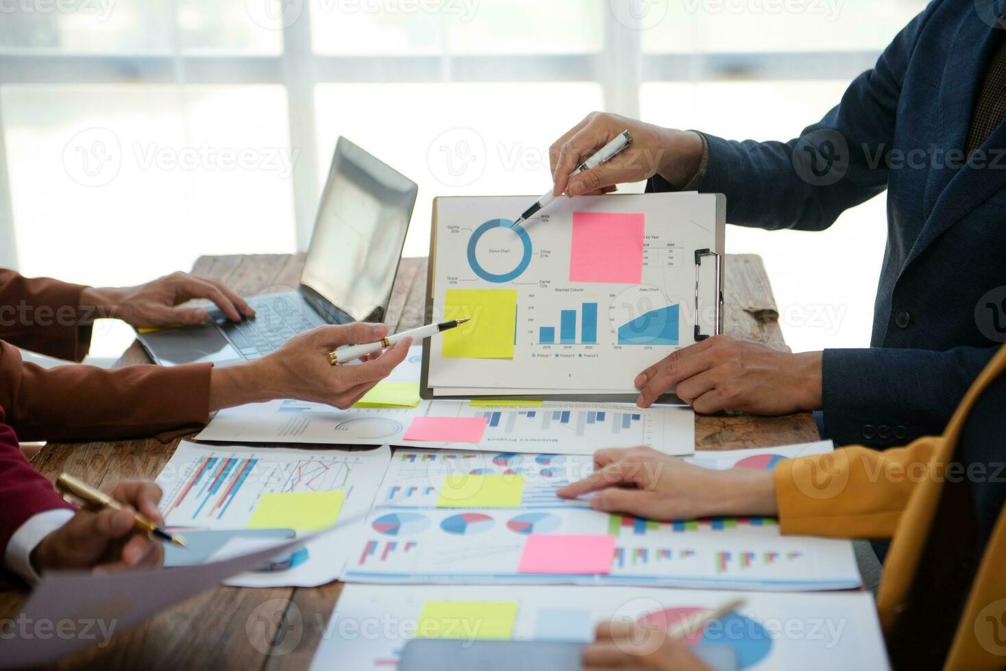 Business People Planning Strategy Analysis Office Concept. writing notes about sticky notes Laptop,tablet  Planning and Brainstorming Strategies of Colleagues photo