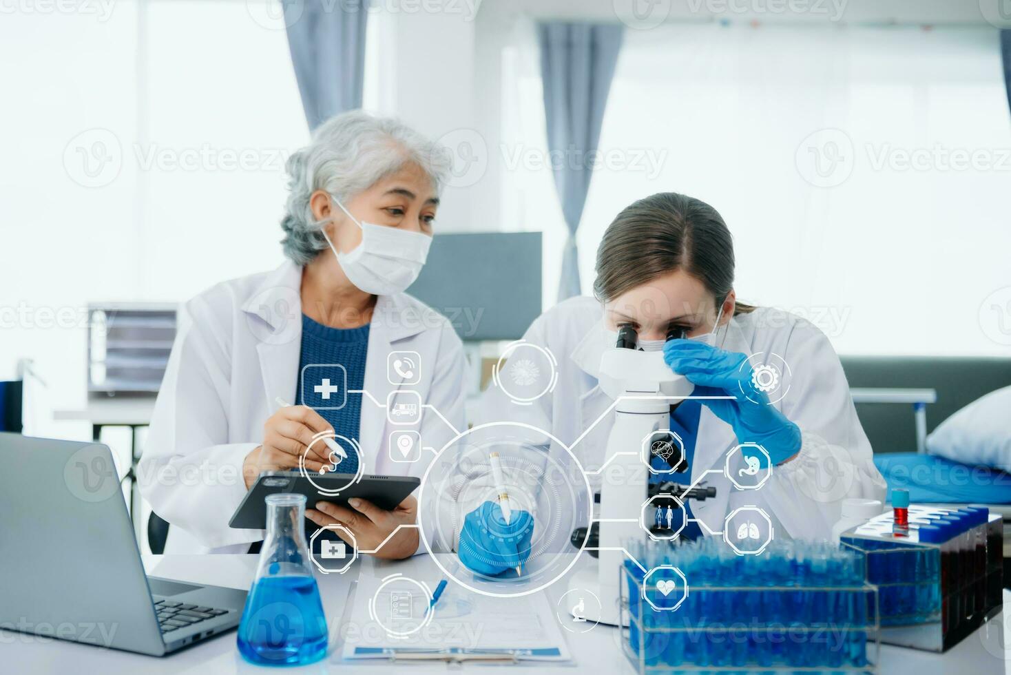 Medical team having a meeting Dctor work on digital tablet healthcare doctor technology tablet using computer in laboratory study with vr icon photo