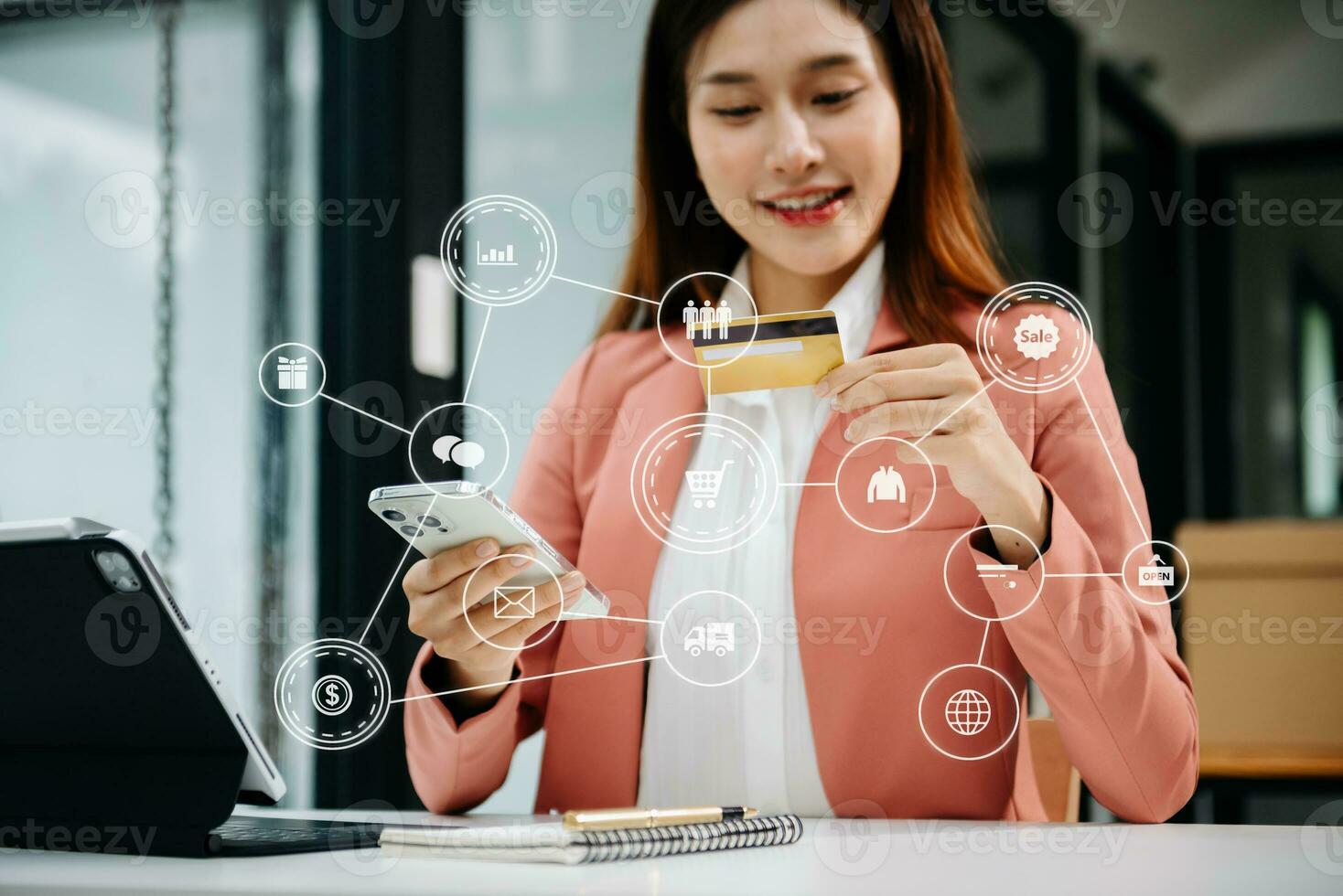 Woman Hand using tablet ,laptop, and holding mobile phone with credit card online banking payment network, internet application vr icon photo