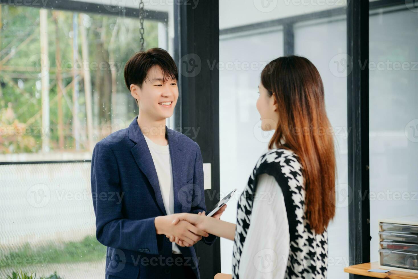 Business partnership handshake concept.Photo two coworkers handshaking process.Successful deal after great meeting. photo