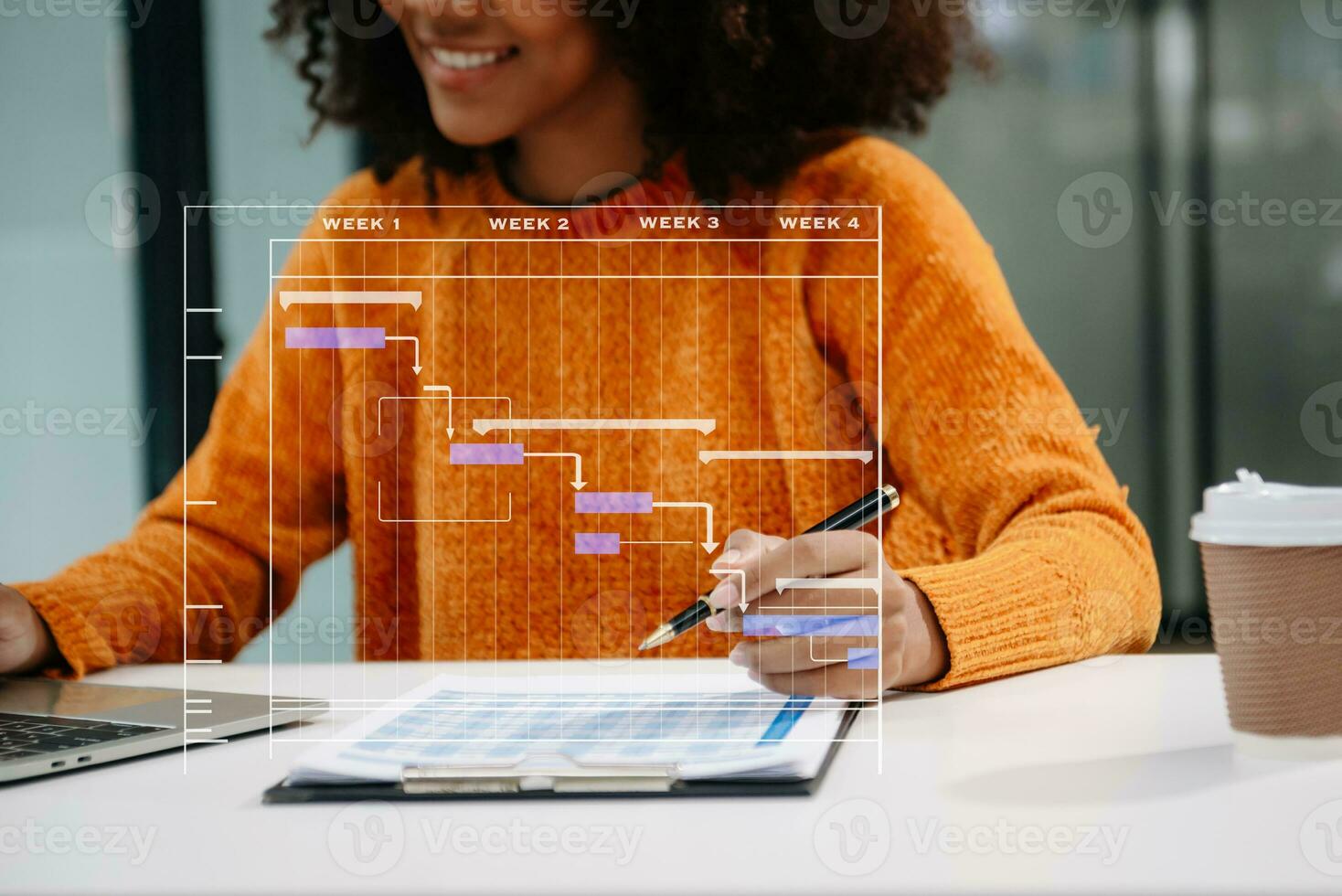 Project manager working and update tasks with milestones progress planning and Gantt chart scheduling diagram. business working with smart phone, tablet and laptop in office. photo