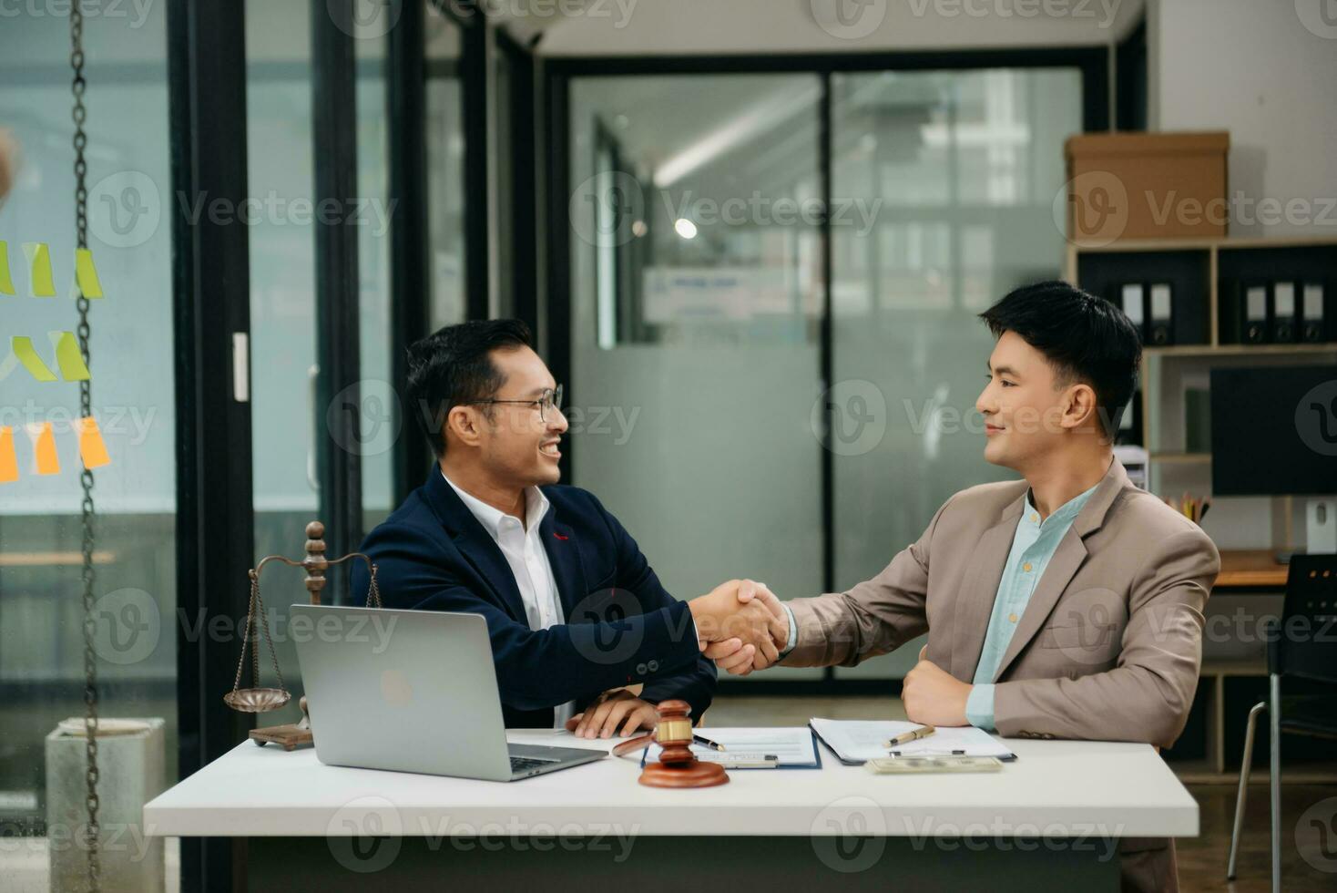 Business and Male lawyer or judge consult having team meeting with client, Law and Legal services concept.Customer service good cooperation in office photo