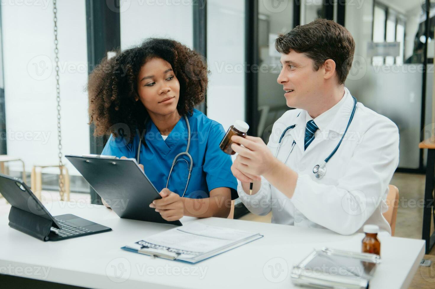 Medical technology network team meeting concept. Doctor hand working with smart phone modern digital tablet and laptop computer photo