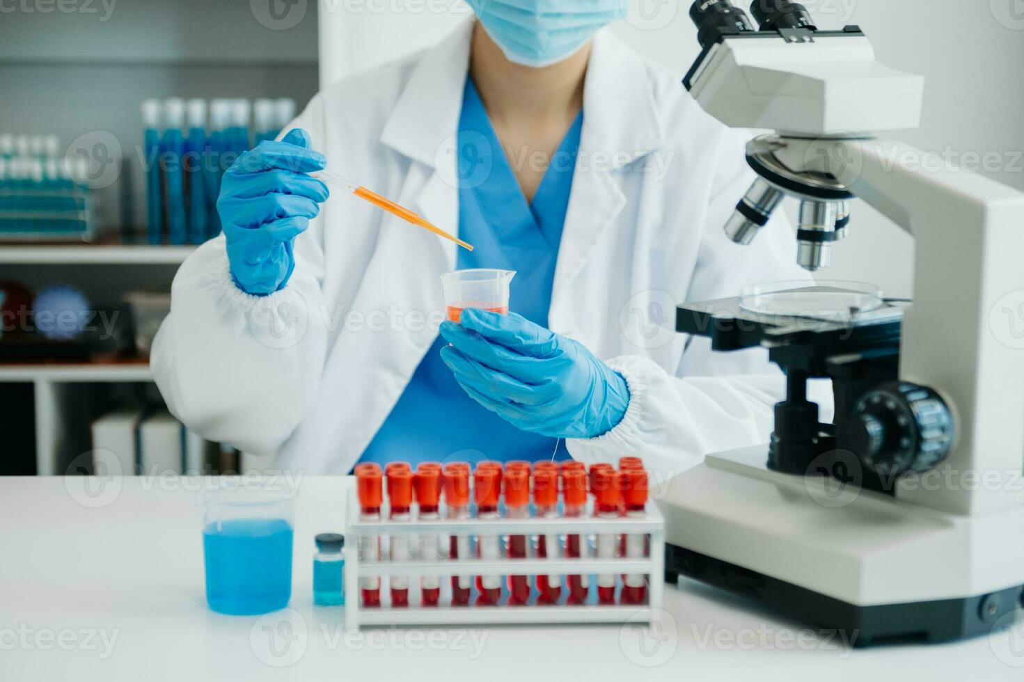 Modern medical research laboratory. female scientist working with micro pipettes analyzing biochemical samples, advanced science chemical laboratory photo