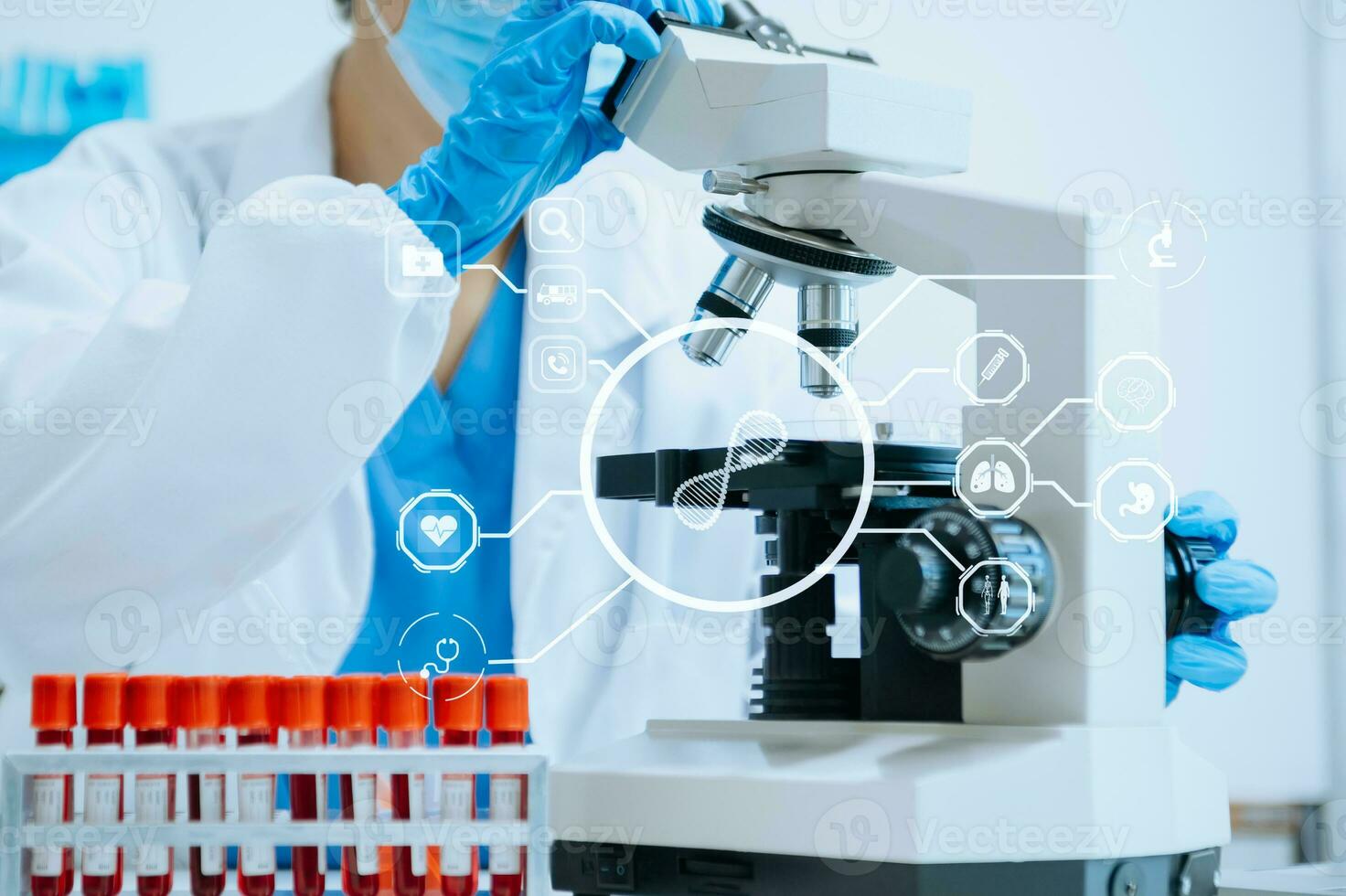 DNA molecule testing concepts. The doctor in a mask examines DNA molecules on the chemical laboratory with virtual icon photo