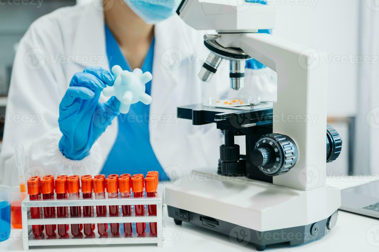 Coronavirus COVID 19 medical test vaccine research and development concept. Scientist in laboratory study and analyze scientific sample of Coronavirus antibody photo