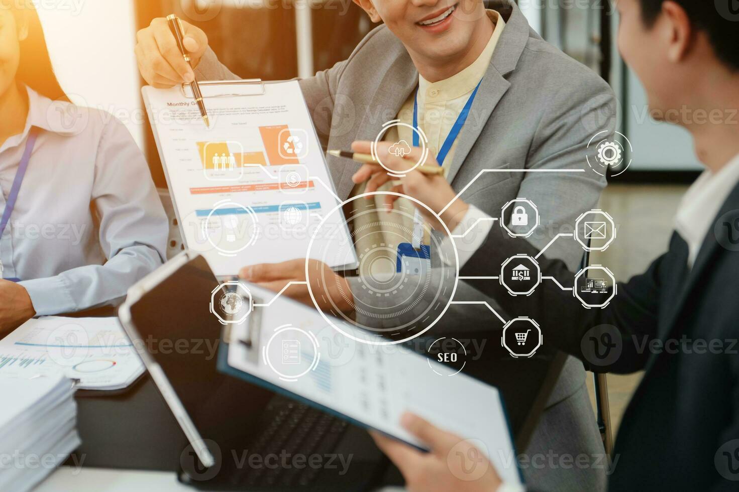 Working team meeting concept, business using laptop and digital tablet with marketing  virtual icon photo