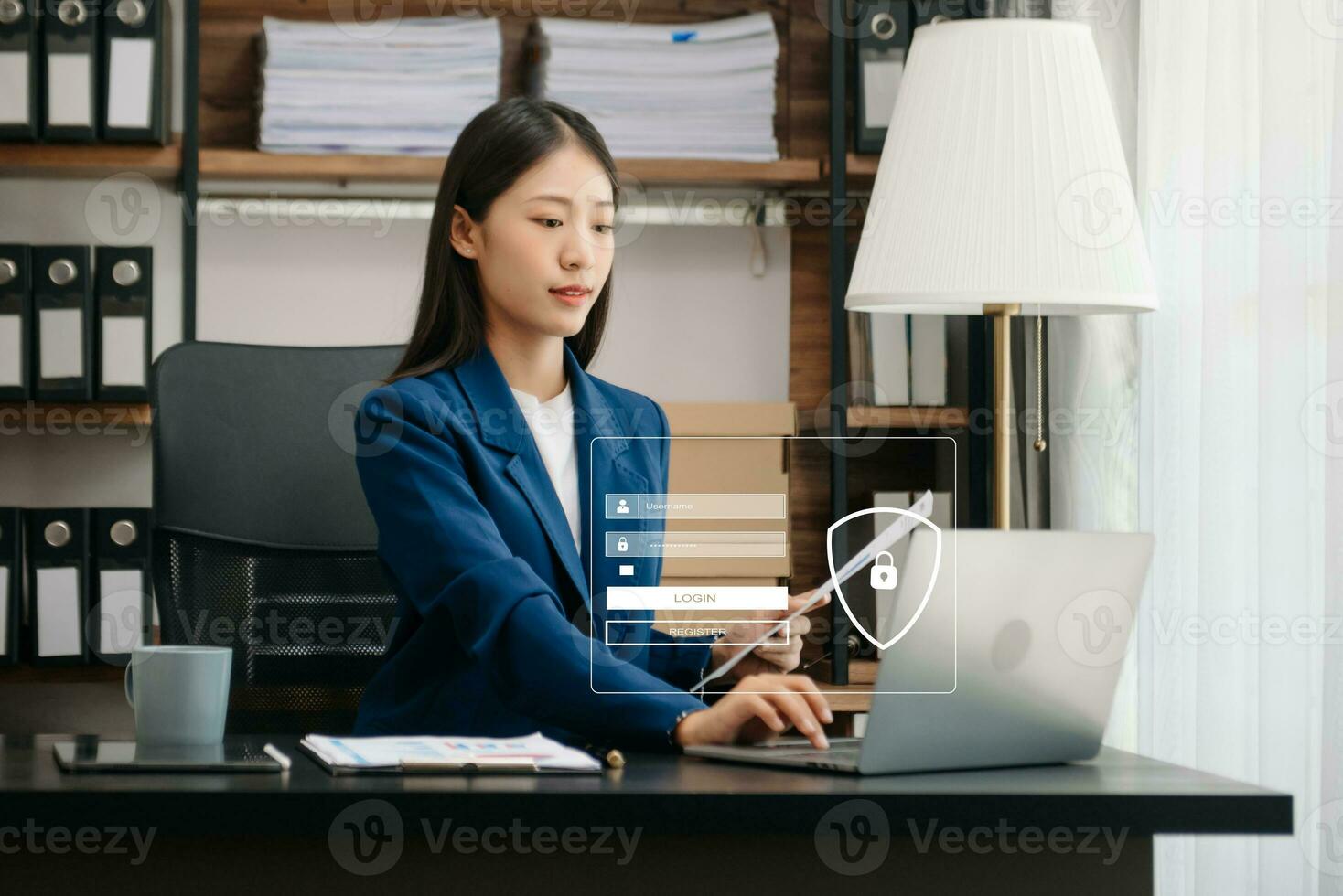 Cyber security concept, Login, User, identification information security and encryption, secure access to user's personal information woman using smart phone and tablet in office photo