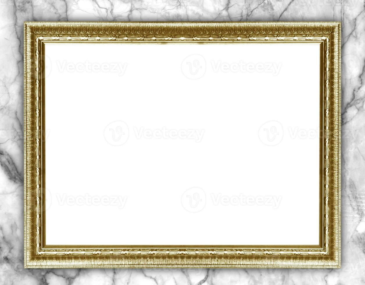 Golden picture frame isolated on marble background photo