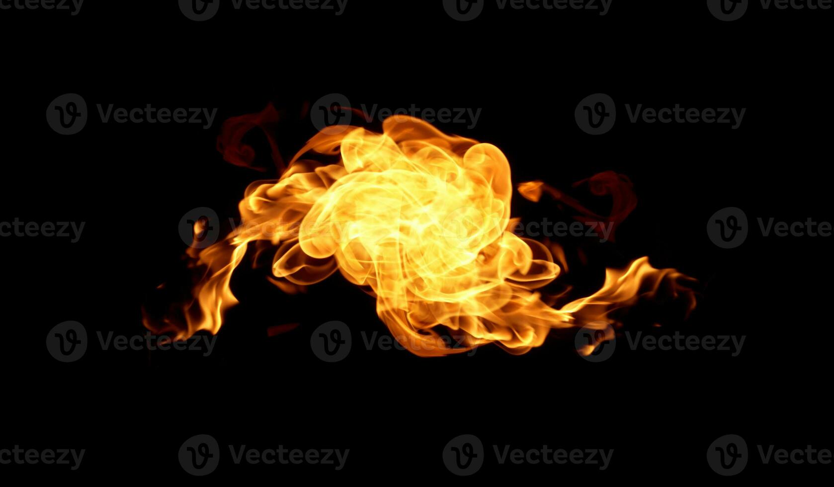 Fire flames on a black background photo