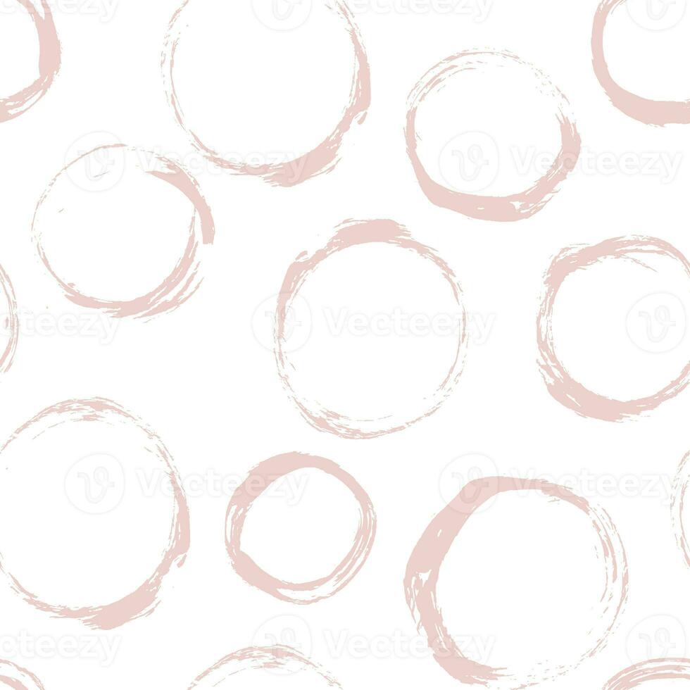Seamless pattern with distressed dry brush circles and spots photo