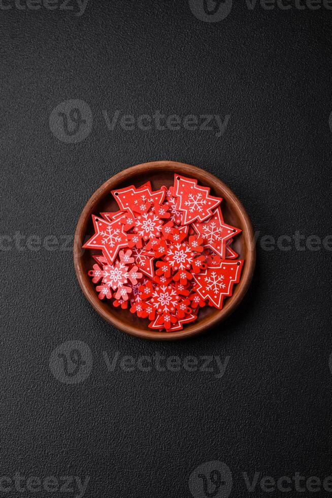 Empty ceramic black plate with christmas decoration elements photo