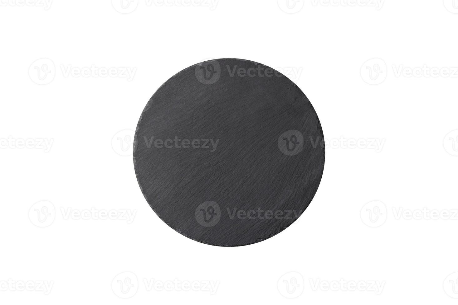 Empty black plate over dark stone background with copy space photo