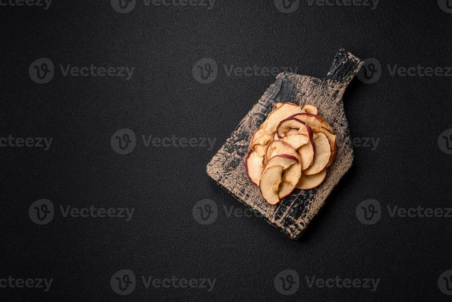Delicious ripe red apple, sliced and dried in a special dryer photo