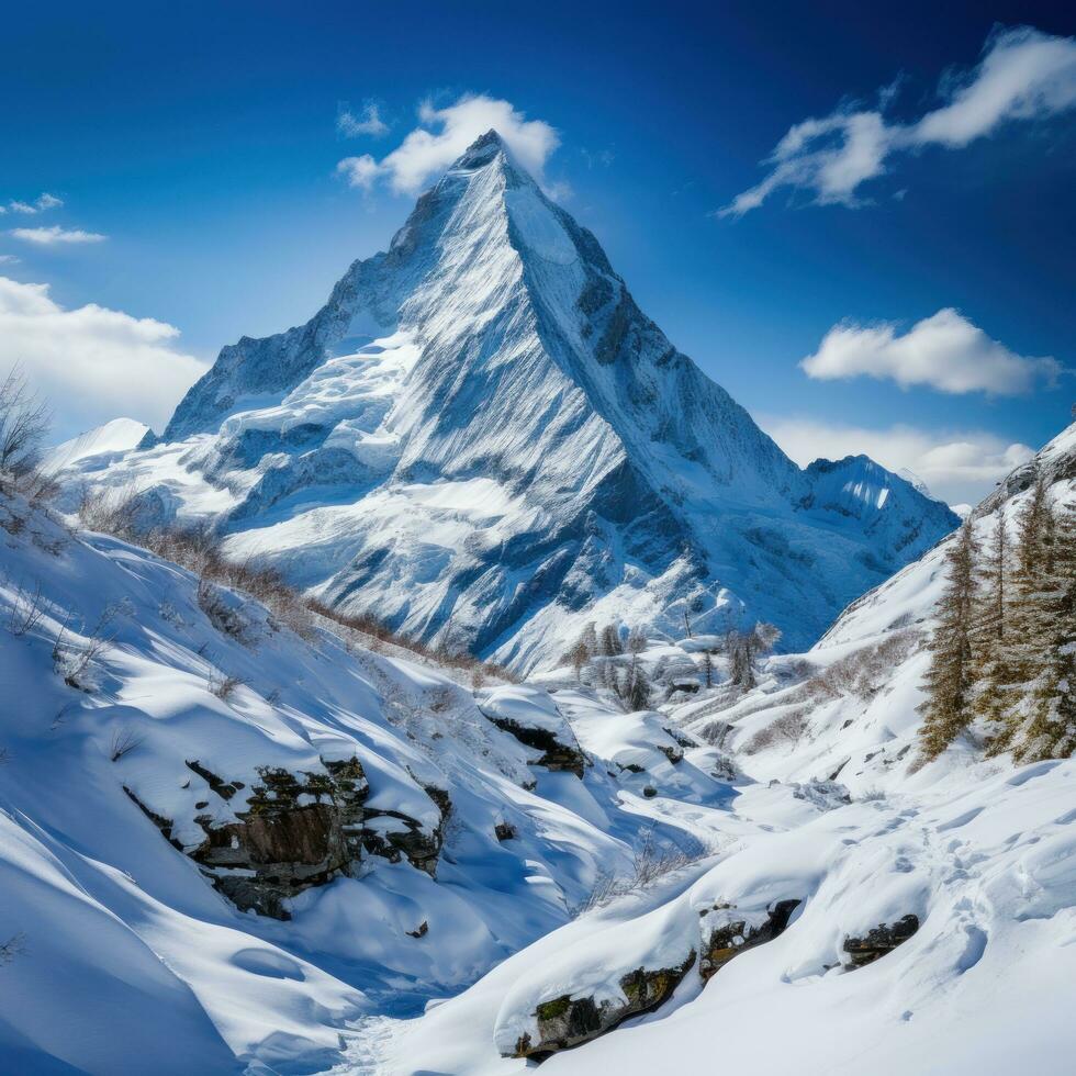 Majestic mountain peak covered in snow photo