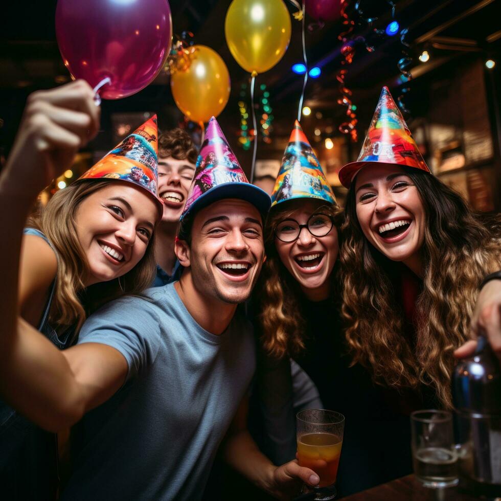 Friends taking a selfie with party hats photo