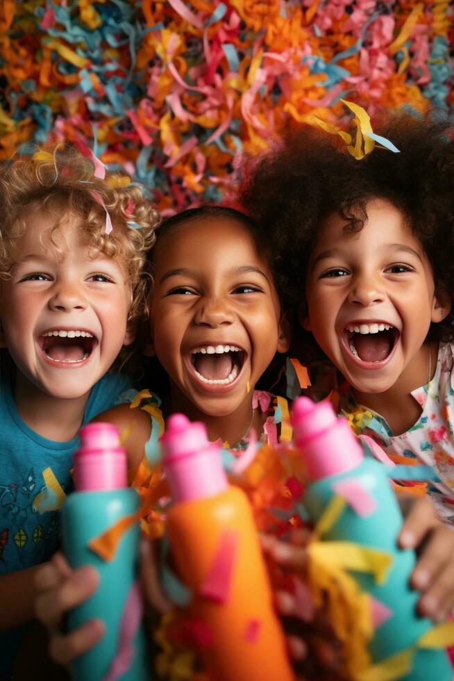 Smiling faces with party poppers and streamers photo