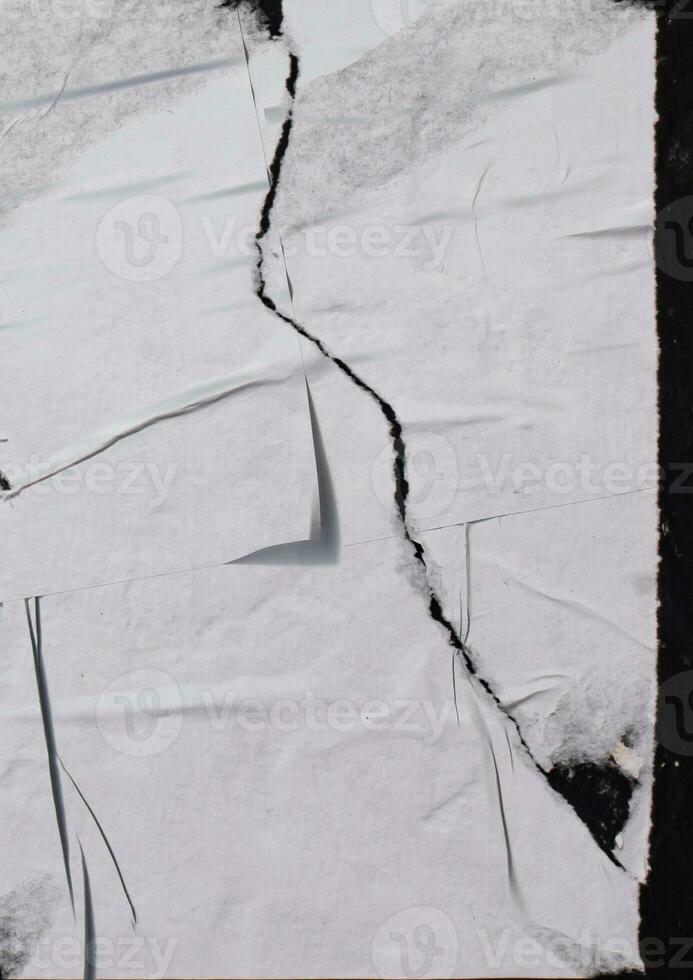 grunge folded paper on wall overlay effect, sticky scratch textures shapes and texture, retro and stained effect, wrinkled vintage paper photo