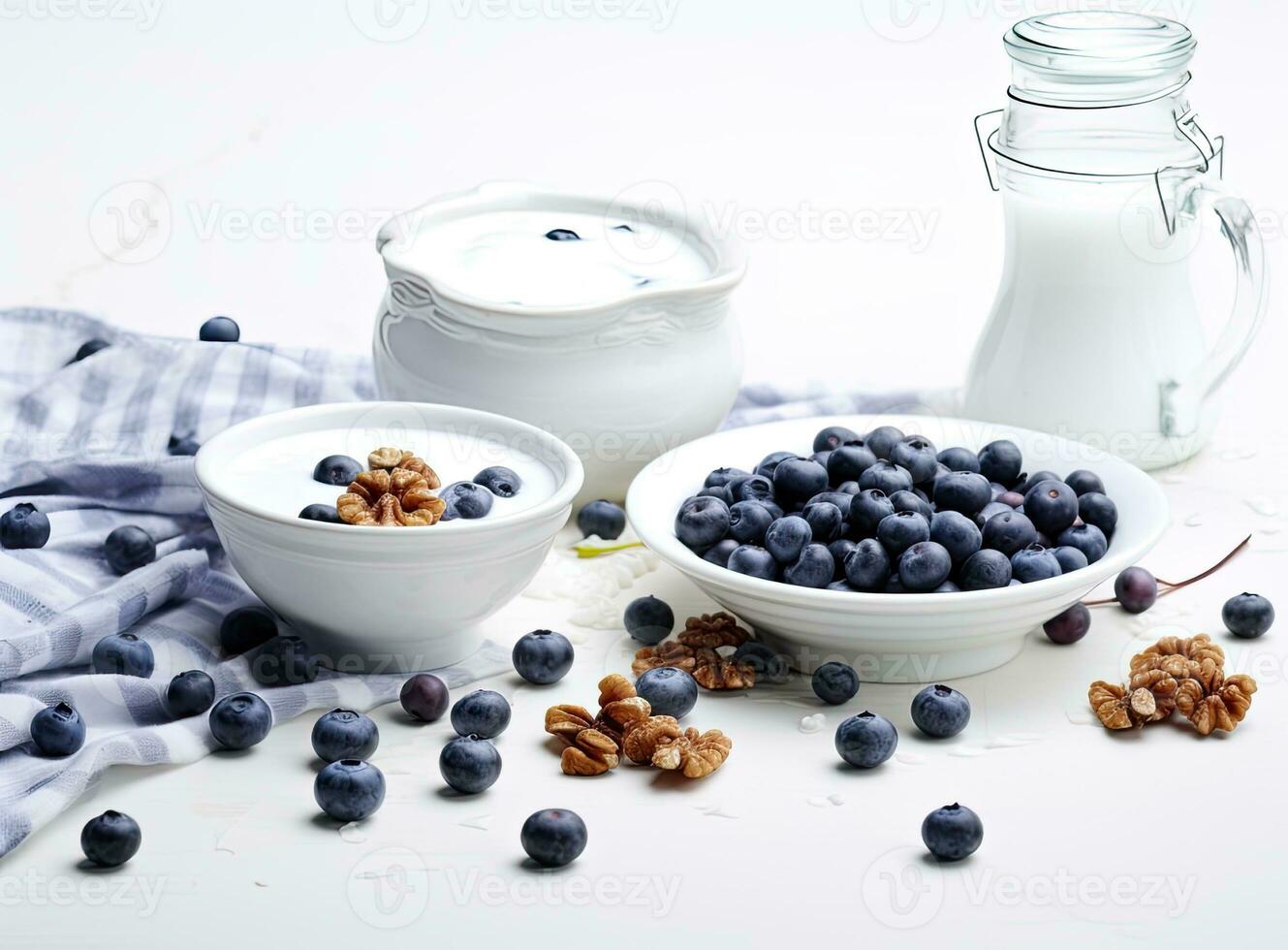 Healthy breakfast ingredients. Homemade granola in open glass jar, milk or yogurt bottle, blueberries and mint on white wooden background, top view, copy space. Created with Generative AI technology. photo