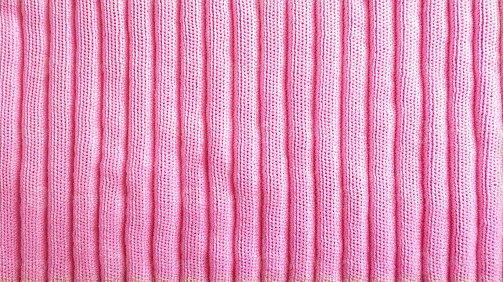 Generative AI, knitted pink sweater texture closeup, magenta or light pink abstract background photo