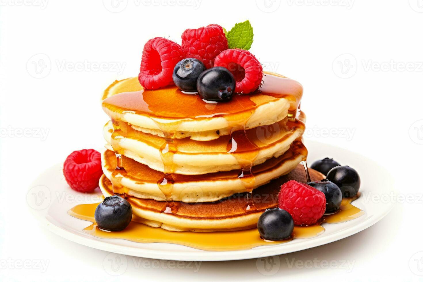 Pancakes stacked with berries syrup isolated on a white background photo
