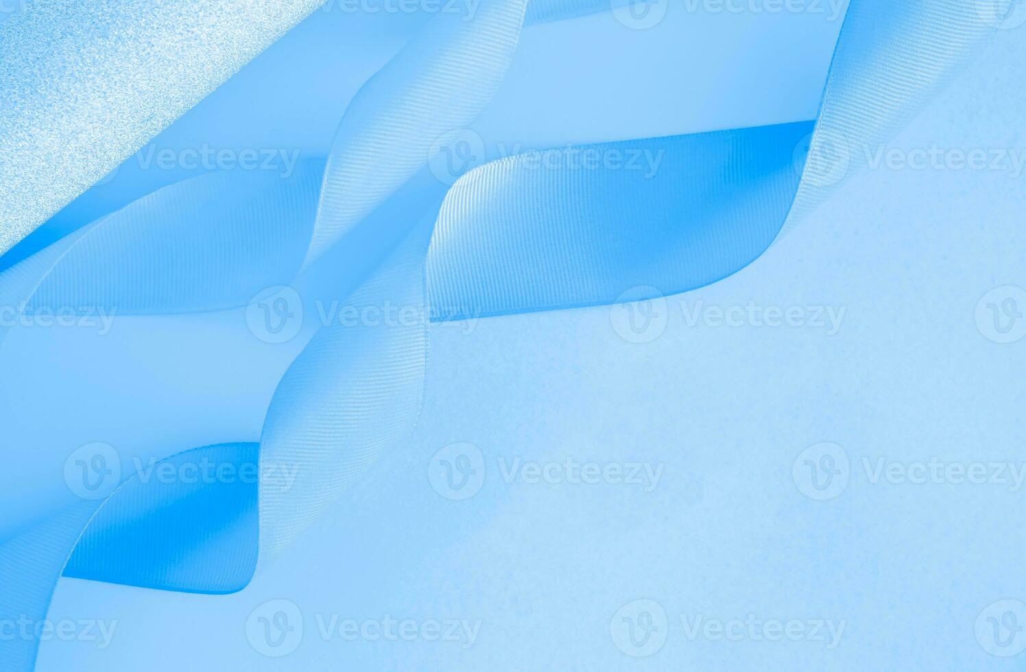 Mesmerizing Canvas of Curled Ribbon and Enchanting Rolled Paper Background photo