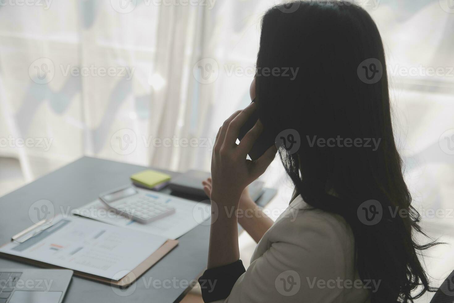 Audit concept,Administrator business man financial inspector and secretary making report calculating balance. Internal Revenue Service checking document. photo