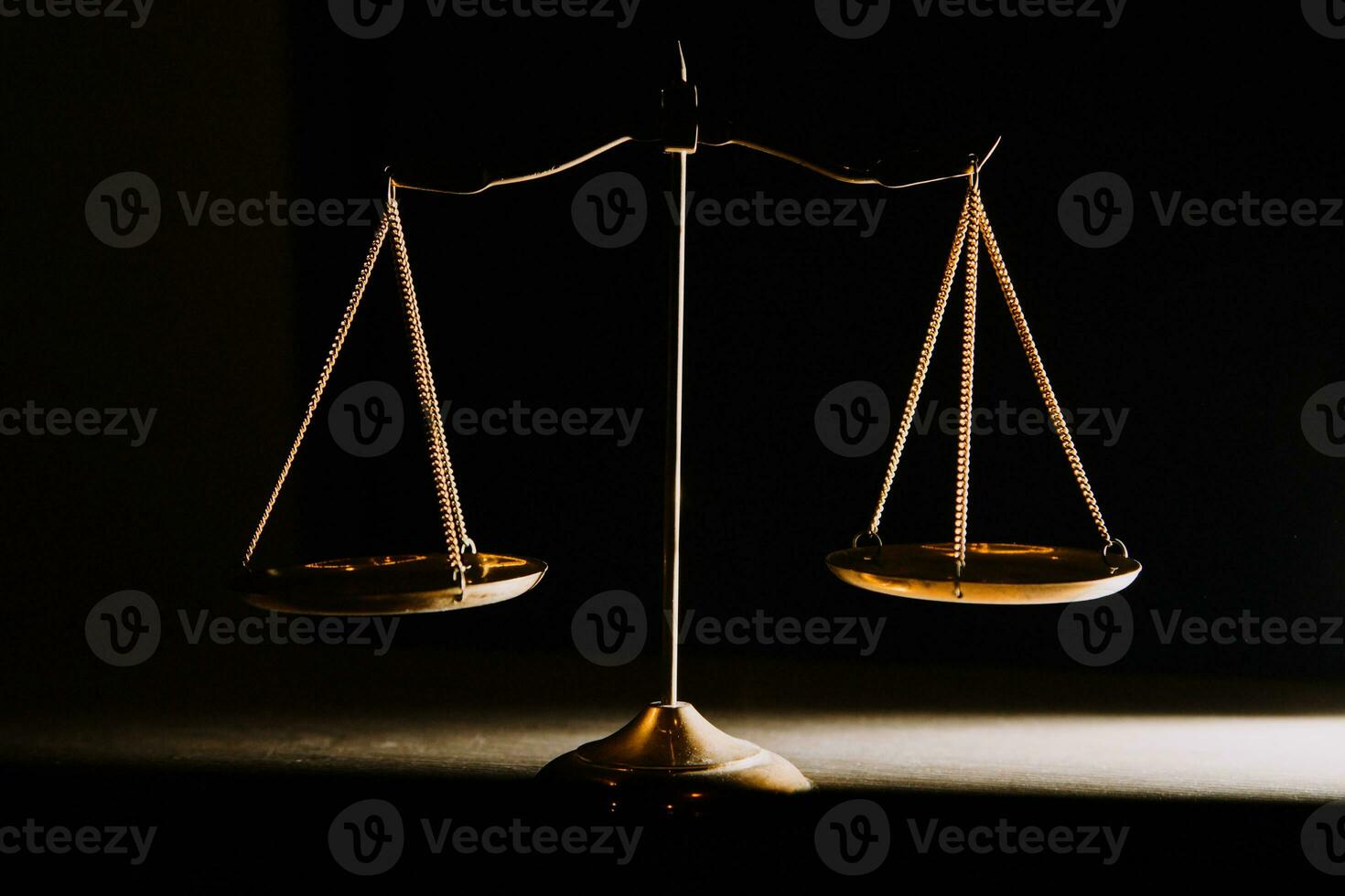 Business and lawyers discussing contract papers with brass scale on desk in office. Law, legal services, advice, justice and law concept picture with film grain effect photo