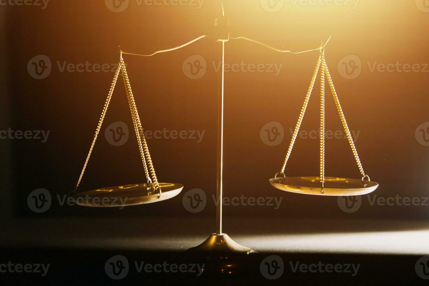 Business and lawyers discussing contract papers with brass scale on desk in office. Law, legal services, advice, justice and law concept picture with film grain effect photo