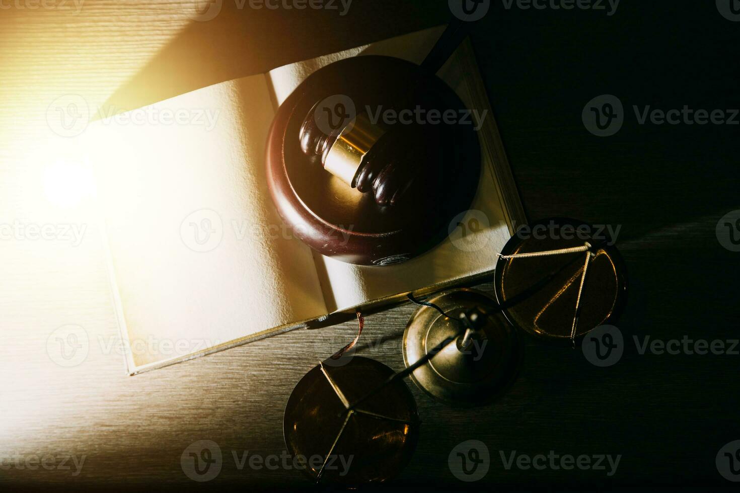 Business and lawyers discussing contract papers with brass scale on desk in office. Law, legal services, advice, justice and law concept picture with film grain effect photo