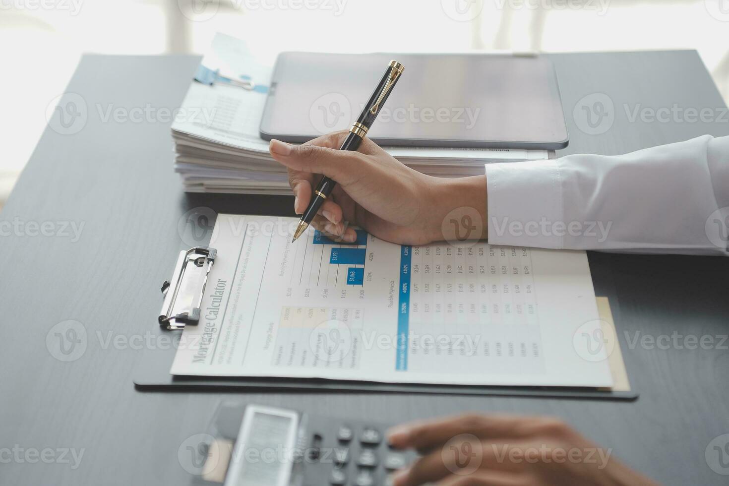 Business Documents, Auditor businesswoman checking searching document legal prepare paperwork or report for analysis TAX time,accountant Documents data contract partner deal in workplace office photo