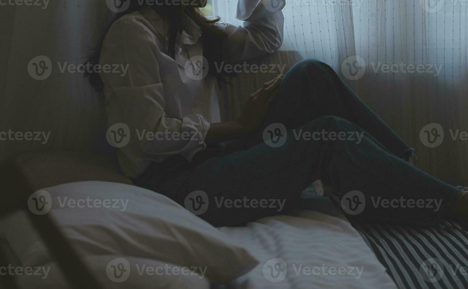 Upset woman having a fight with a man at home. Hispanic wife slapping the face of her husband during an argument because of their relationship problems photo