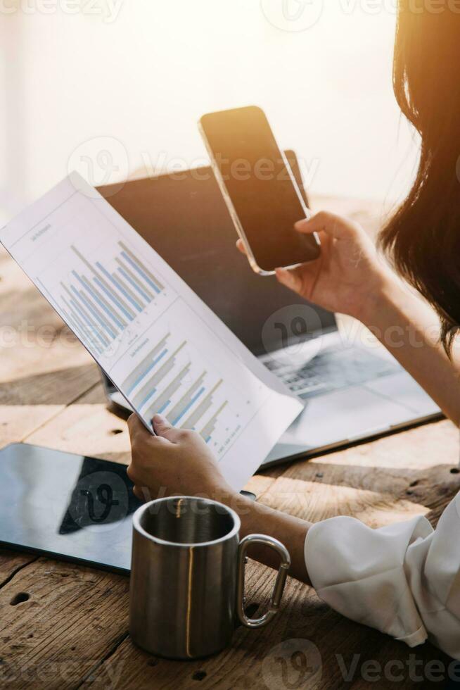 Business Man Financial Inspector and Secretary Making Report, Calculating or Checking Balance. Internal Revenue Service Inspector Checking Document Audit Concept photo