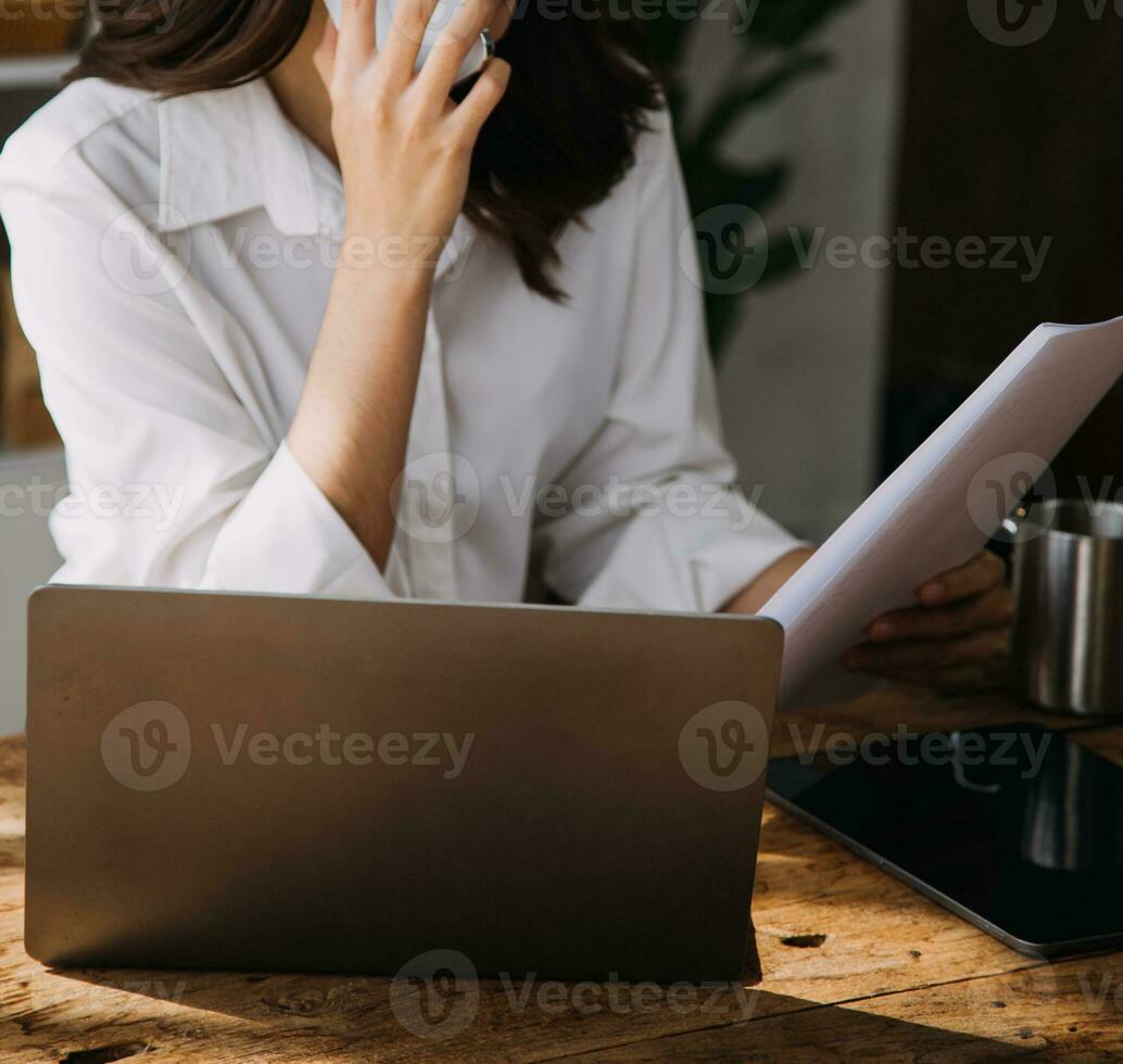 Business Man Financial Inspector and Secretary Making Report, Calculating or Checking Balance. Internal Revenue Service Inspector Checking Document Audit Concept photo