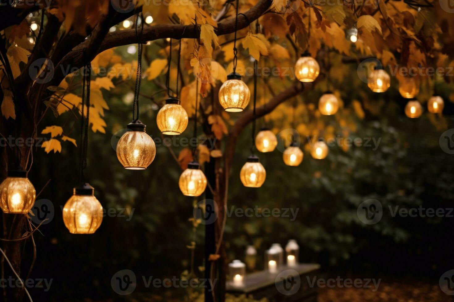Lanterns hanging from tree branches, illuminating the garden with a