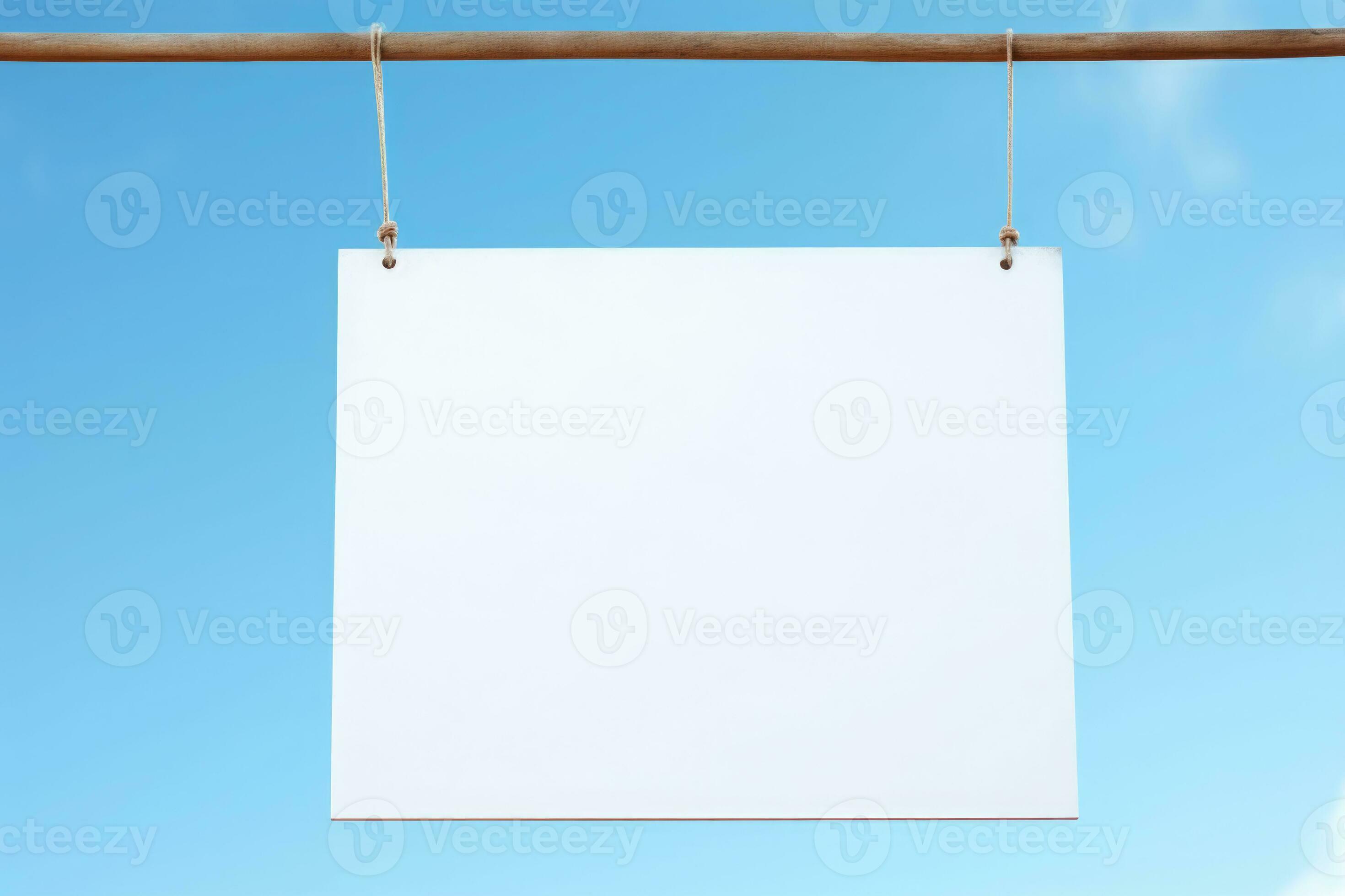 Blank white signboard with hanging with string on blue background.  Generative AI 29511977 Stock Photo at Vecteezy