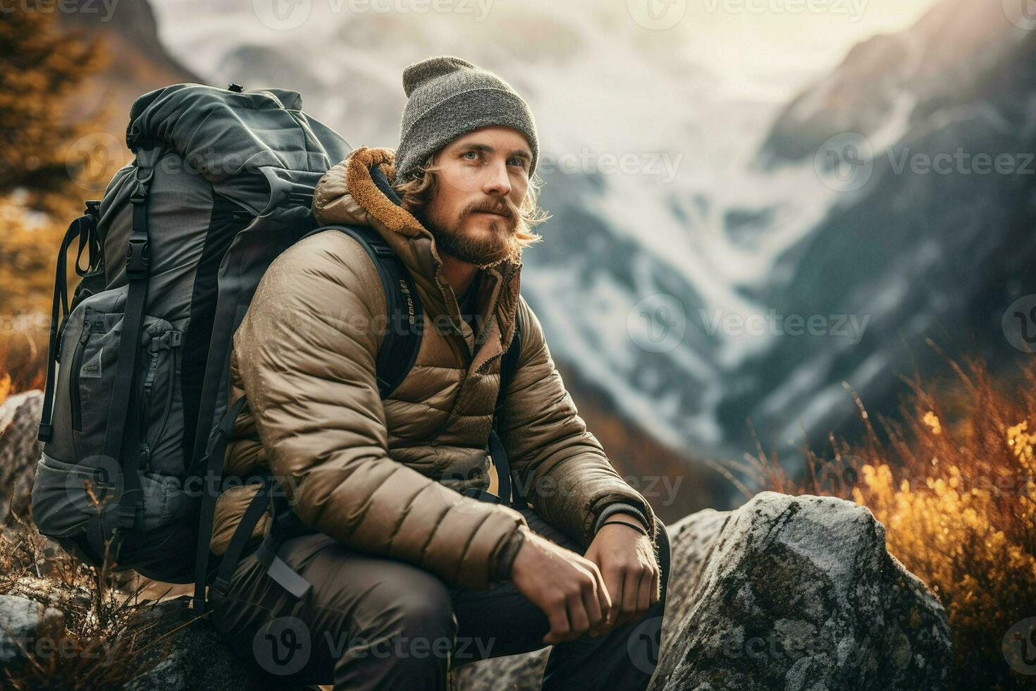 Handsome bearded man with a backpack sitting on a rock in the mountains. ai generated pro photo