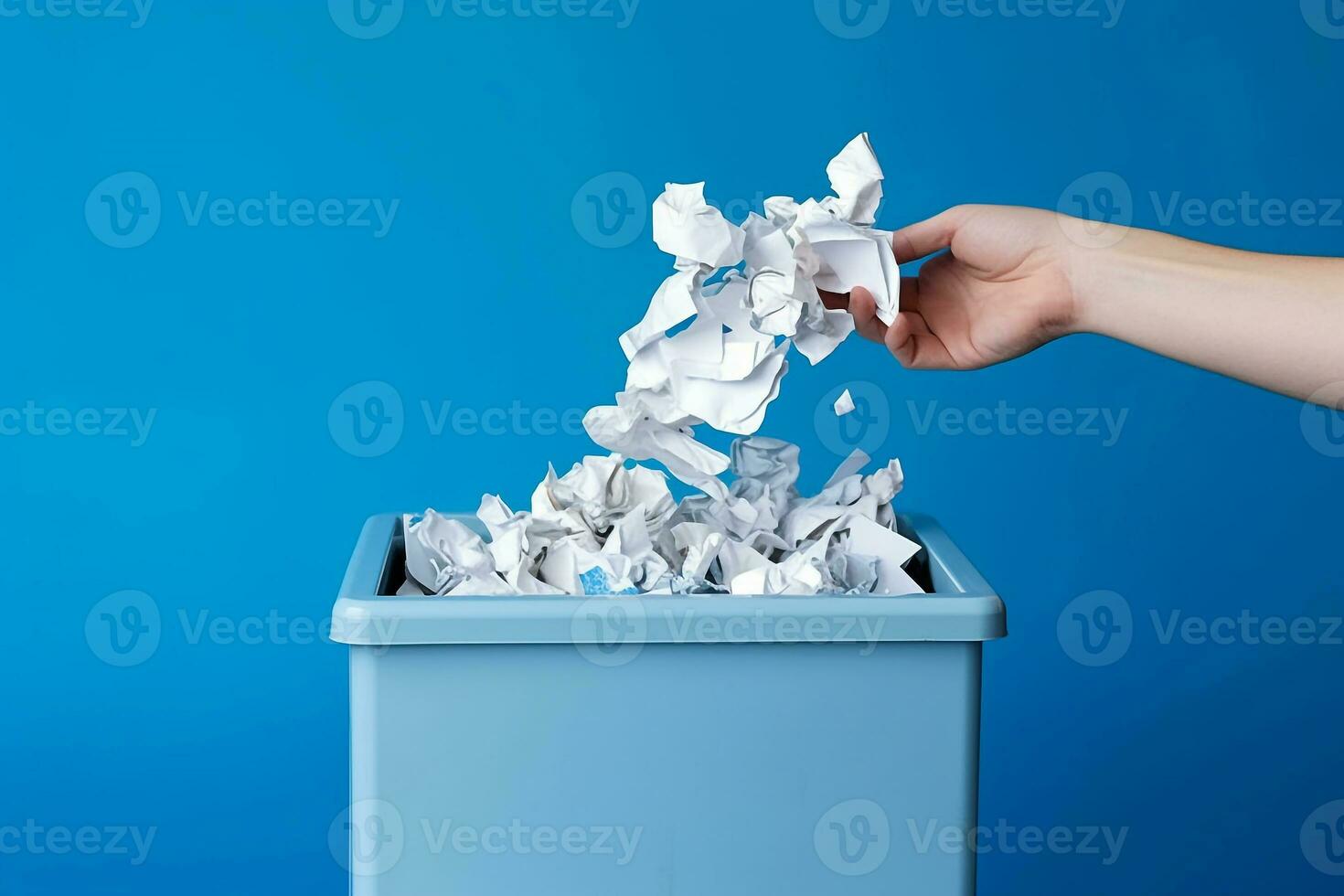 Hand throwing crumpled paper in the recycling bin.Generative Ai. photo