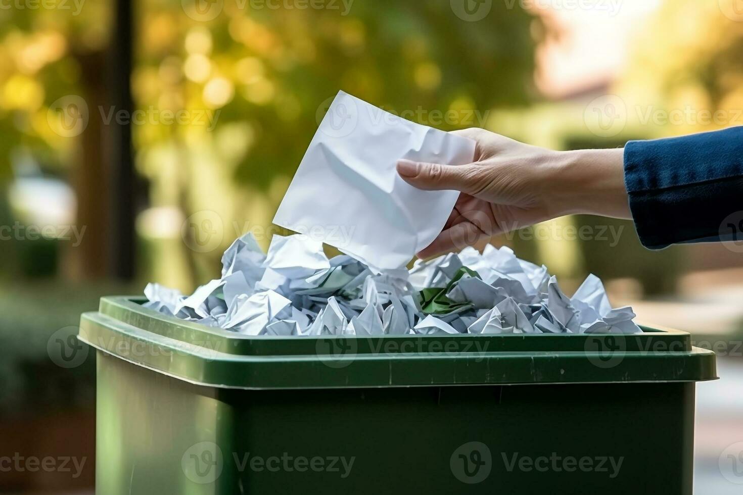 Hand throwing crumpled paper in the recycling bin.Generative Ai. photo