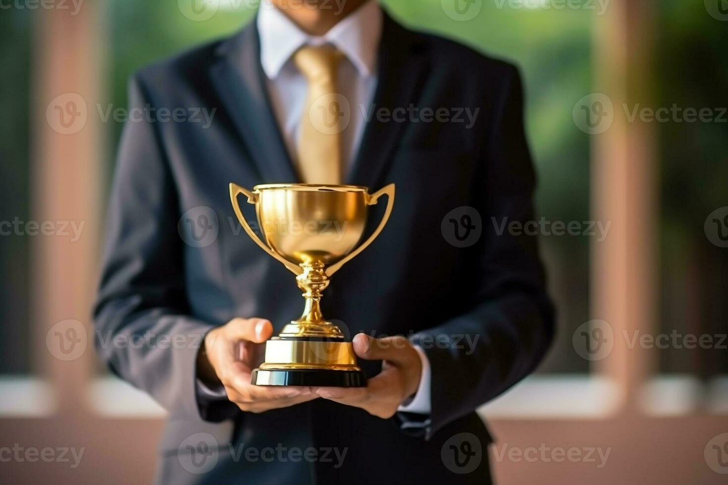 Businessman showing trophy to show victory.Generative Ai. photo