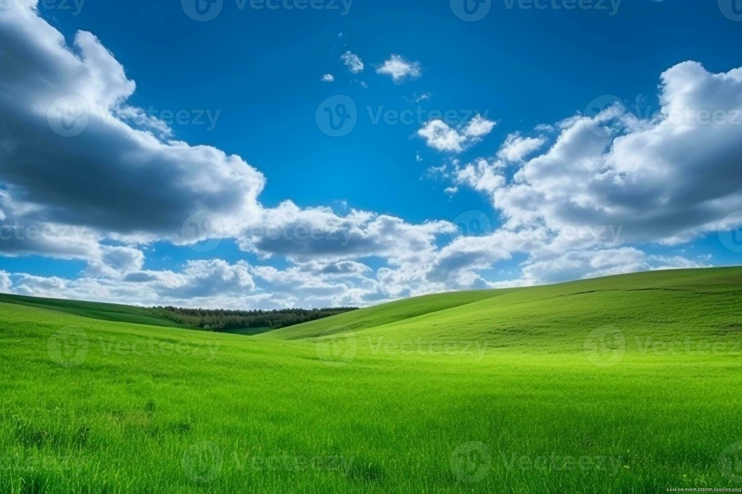 Green meadows on hill with blue sky photo