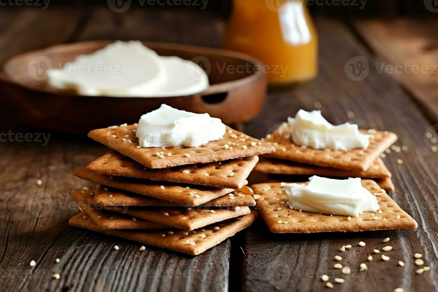 Crackers with cream cheese ,mint leaf in the wooden background photo